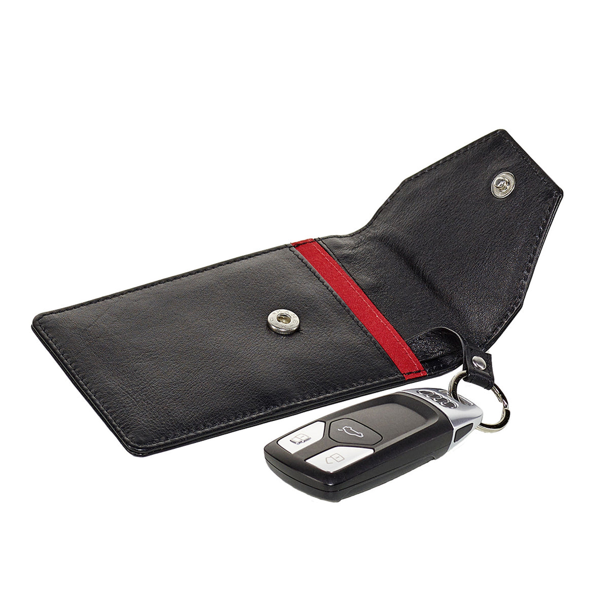 Key Protector, schwarzes Etui an dem ein Schlüssel gesichert ist.
